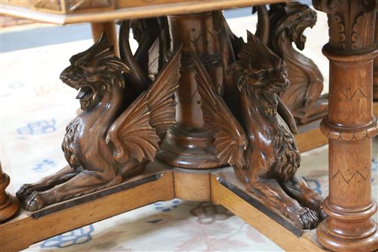 A Victorian Gothic revival golden oak centre table, Diam.4ft 2in. H.2ft 6in.